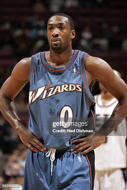 Gilbert Arenas of the Washington Wizards looks on during the game against the New Jersey Nets at Continental Airlines Arena on November 19, 2005 in...