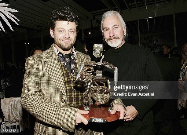 Actor Andy Serkis and make-up artist Rick Baker attend the "King Kong" world premiere after party at Pier 92 December 05, 2005 in New York City.