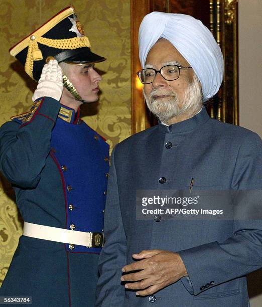 Moscow, RUSSIAN FEDERATION: Indian Prime Minister Manmohan Singh walks into the Kremlin in Moscow 06 December 2005 before a meeting with Russian...