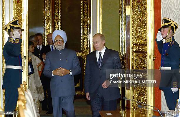 Moscow, RUSSIAN FEDERATION: Russian President Vladimir Putin and Indian Prime Minister Manmohan Singh walk during their meeting at Moscow's Kremlin,...