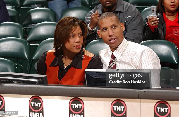 Former Indiana Pacer and current TNT basketball Reggie Miller sits at the announcers table with his sister, TNT sideline correspondent, Cheryl Miller...