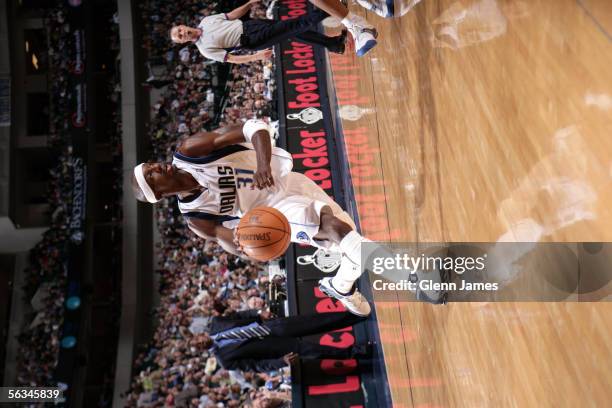Jason Terry of the Dallas Mavericks drives upcourt during the game against the Detroit Pistons on November 19, 2005 at American Airlines Center in...