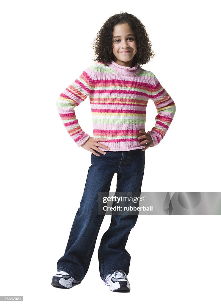 Portrait of a girl smiling and standing