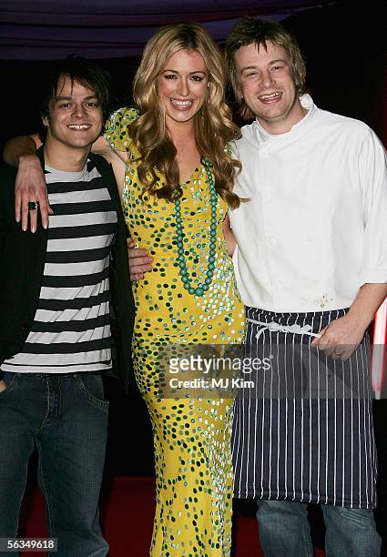 Jamie Cullum, Cat Deeley and Jamie Oliver arrives at The Big Night In With Jamie Oliver at Finsbury Barracks on December 6, 2005 in London, England....