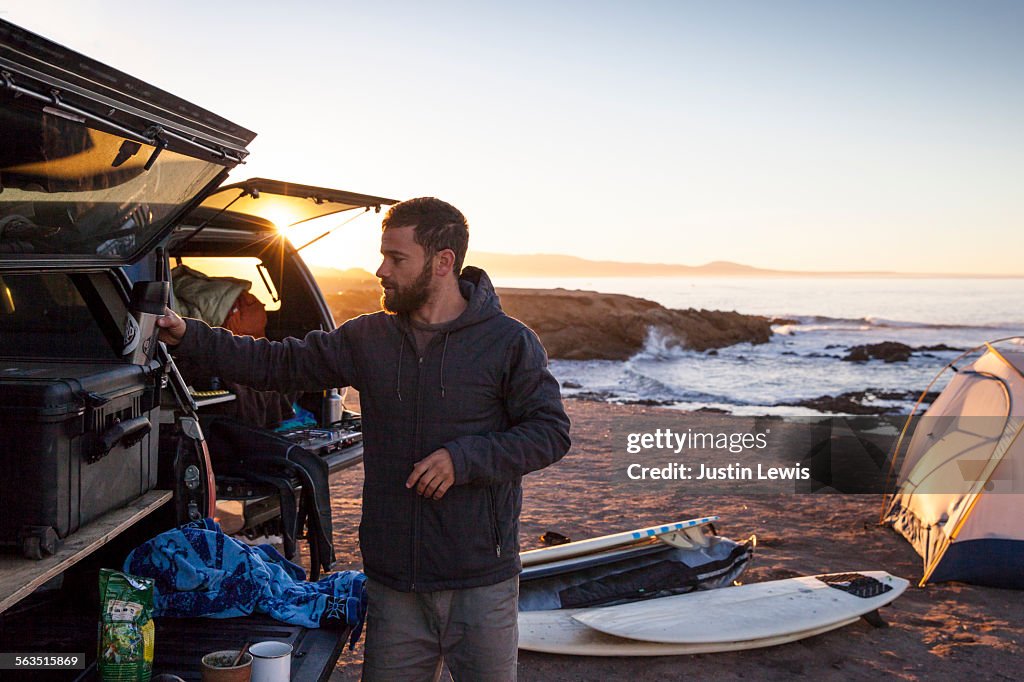 Surfer Prepares for Day of Adventure