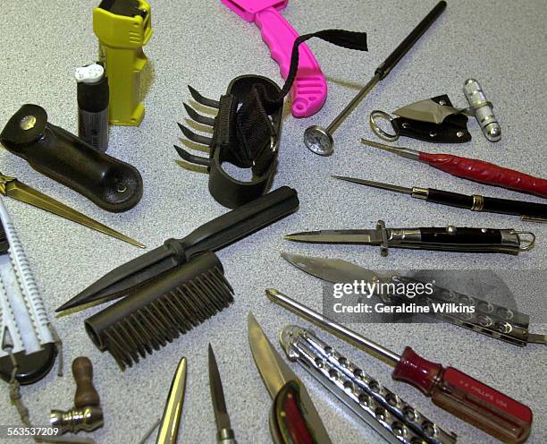 Orange County Deputy Sheriff Sergeant Rudy Mena displayed many of the items that were confiscated at the metal detection sites at Orange County...