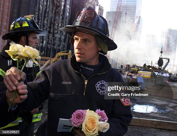 That was erected closer to the rubber at Ground Zero following a Family Memorial Service held at Ground Zero of the WTC held on Sunday, in New York...