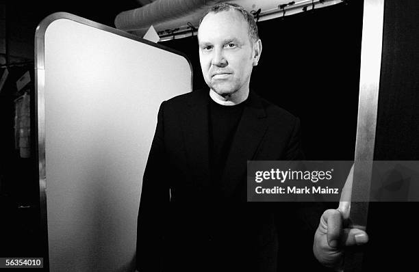 Designer Michael Kors poses backstage at the Michael Kors Spring 2006 fashion show during Olympus Fashion Week at the New York Public Library on...