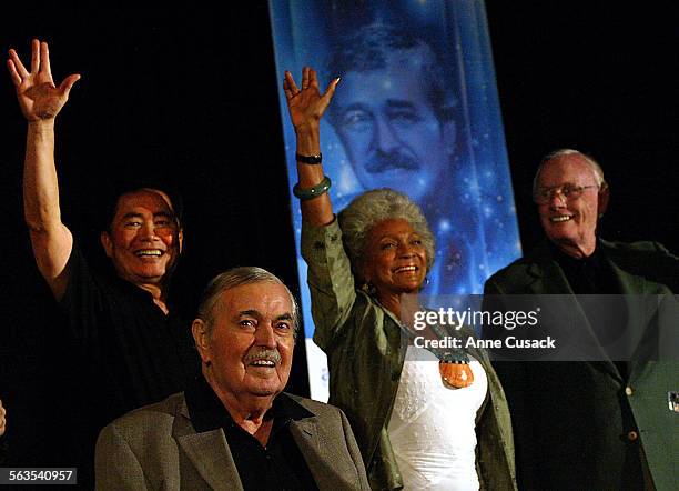 To R George Takei, James Doohan,Nichelle Nichols, and Neil Armstrong. At a Startrek Convention held at the Renaissance Hotel in Hollywood James...