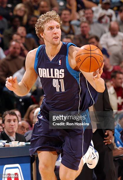 Dirk Nowitzki of the Dallas Mavericks brings the ball up against the Indiana Pacers on December 6, 2005 at Conseco Fieldhouse in Indianapolis,...