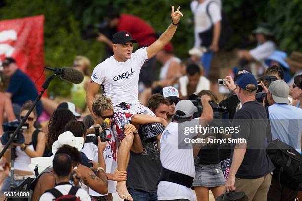 West Australian Jake Paterson of Yallingup is carried up the beach by friends after winning the O'Neill World Cup Of Surfing, part of the Vans Triple...