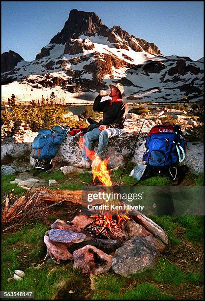 Island Campsite. Jeff Winter of Van Nuys camped at 1000 Island with view of Banner Peak 945 elevation. Rainbow and Brook trout.