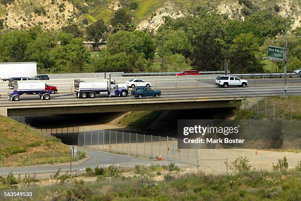 View of the wildlife corridor running underneath the 91 freeway where the Coal Canyon exit used to be, as viewed from Chino Hills State Park. April...