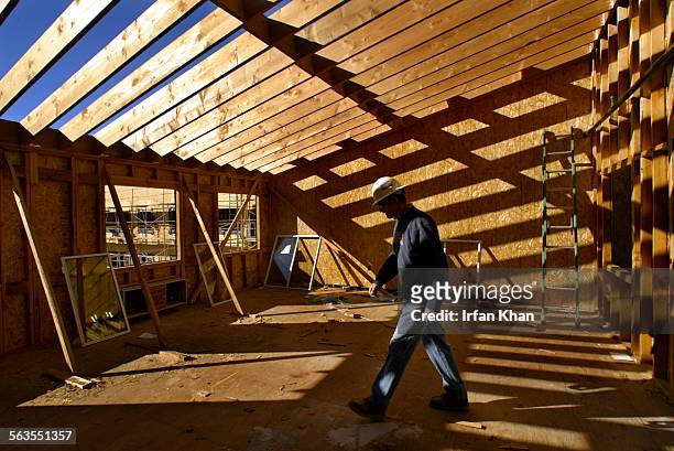 San Bernardino, Dec.17, 2004.  Paul Kunze of Ellias Construction, walks through the future Arts and Crafts room on the third floor of an under...
