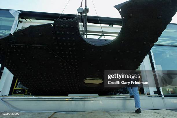 Ton section of the Titanic hull, the largest piece of the sunken ship ever recovered from the ocean floor, was installed today at the California...