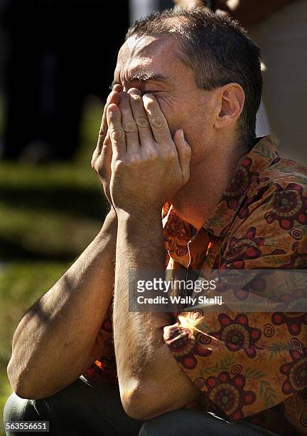 Steven Jones, son of cult leader Jim Jones, listens to a speaker during a memorial service on the 25th anniversary of the Jonestown murder and...