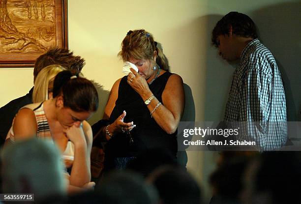 Friends of Jacquel and Jonathan Herbert attend a memorial service Sunday, September 28, 2003 at the First Baptist Church of Laguna Hills. The brother...