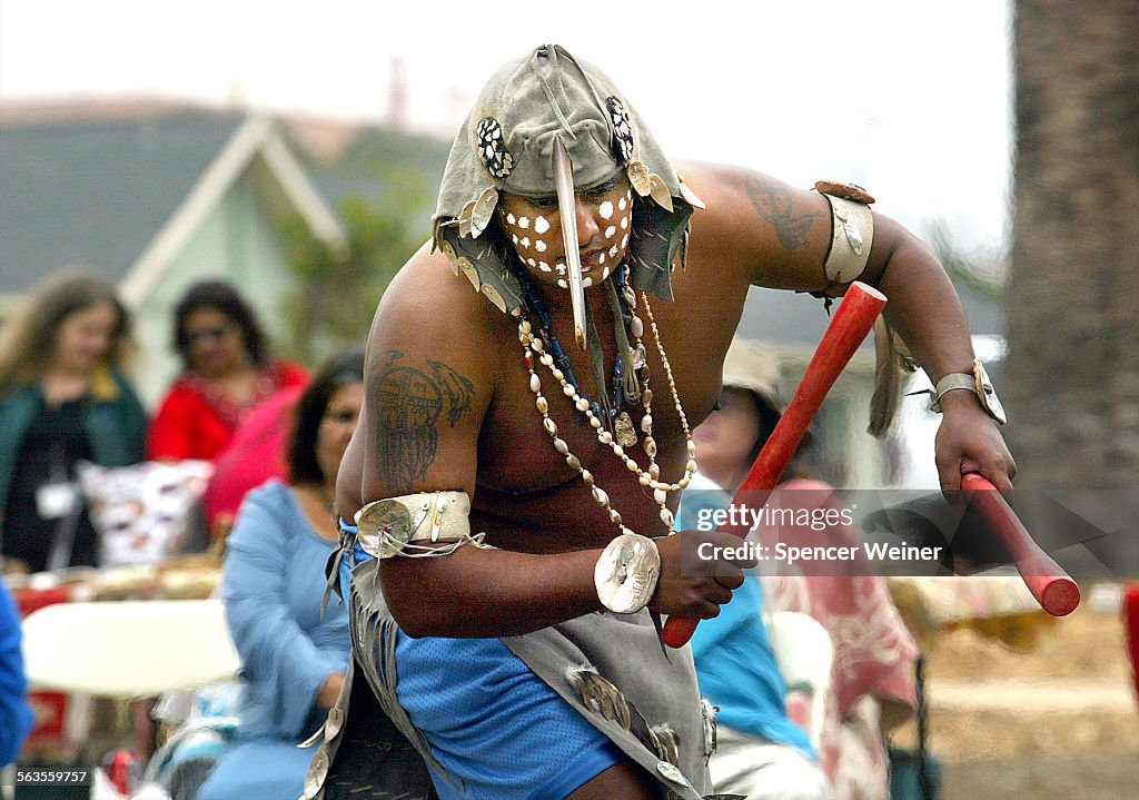 Jessie Preciado (cq) performs the swordfish dance. Chumash dancers and storytellers gathered Sunday