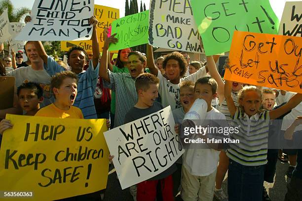 Riverside. Sept. 25, 2003  Children of neighborhood protesting in front of David Claud Phillips residence. Phillips , 54yearold convicted child...