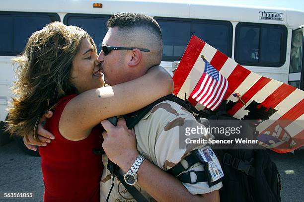 Ventura County, Calif., August 24, 2003.A warm welcome home for Seabee John Hardesty from his wife, Cindy Hardesty . About 100 Seabees attached to...