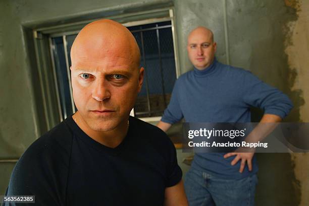 Actor Michael Chiklis and producer Shawn Ryan are photographed for Los Angeles Times on March 7 2002 on the set of 'The Shield' in Los Angeles,...