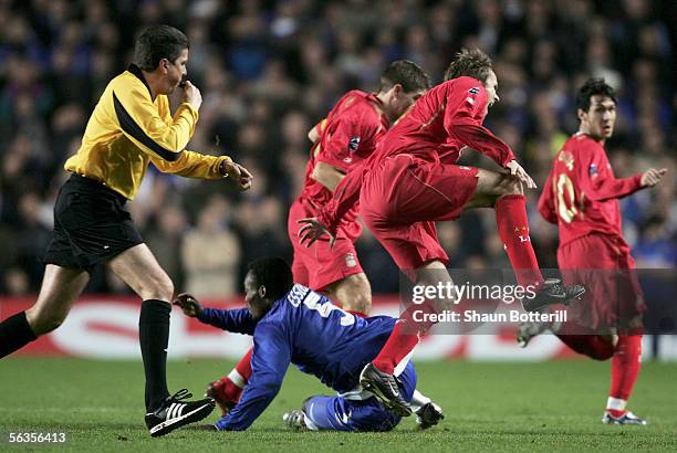 Mickael Essien of Chelsea tackles Dietmar Hamann of Liverpool during the UEFA Champions League Group G match between Chelsea and Liverpool at...