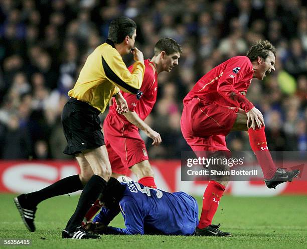 Mickael Essien of Chelsea tackles Dietmar Hamann of Liverpool during the UEFA Champions League Group G match between Chelsea and Liverpool at...