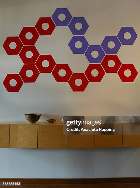 New wall graphics that go on and off easily are colorful and geometric. Scott Flora and Jerinne Neils are design partners of "blik" designs. Photo...