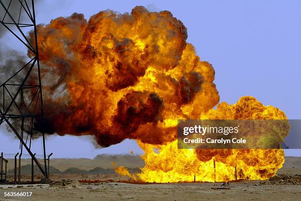 An explosion Saturday night at an oil pumping station outside of Hit, Iraq, started a fire that continued to burn late Sunday. A U.S. Army helicopter...