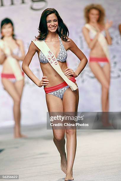 Contestant of the 55th Miss World 2005, Dafne Molina Lona of Mexico performs during the Beachwear Final at the Sheraton Sanya Resort on December 6,...