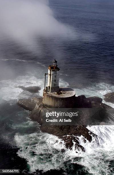 Crescent City, CA. St. George Reef Lighthouse. Arial view of the St. George Reef Lighthouse first illuminated in 1892. The granite base and tower is...