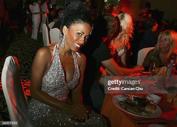 Contestant of the 55th Miss World 2005, Moana-Sarann Robinel of Martinique attends a dinner party after the Beachwear Final at the Sheraton Sanya...