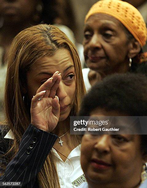 An audience member, Angela Rye, is moved to tears as Rev. Jesse Jackson makes an eloquent plea to reconsider closing the King Drew trauma center at...
