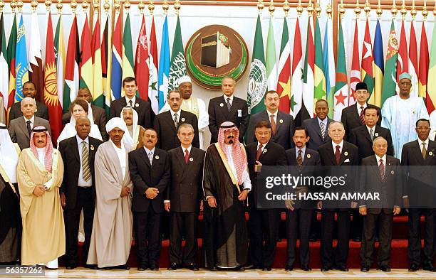 Leaders of the 57-member Organisation of the Islamic Conference pose during a photo opportunity at the Al-Safa palace in the holy Muslim city of...