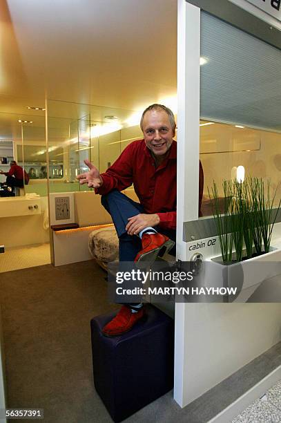 United Kingdom: Simon Woodroffe, founder of the Yo! poses for photographs at the entrance to a model of one of his Yotel Group hotel bedrooms, in...