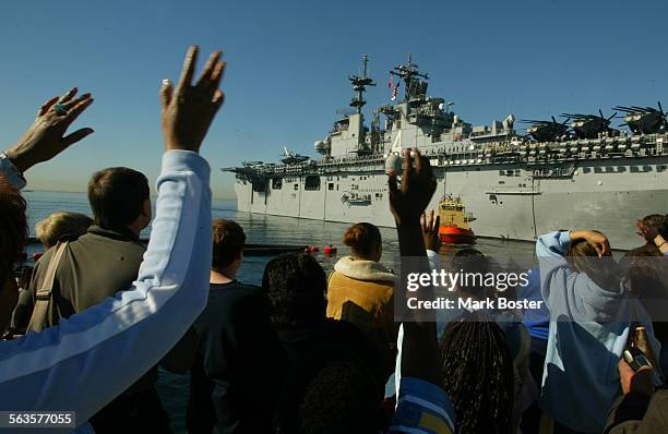 Tearful family members and friends said their goodbyes to the 900 Sailors and 200 Marines aboard the USS Boxer. The amphibious helicopter carrier...