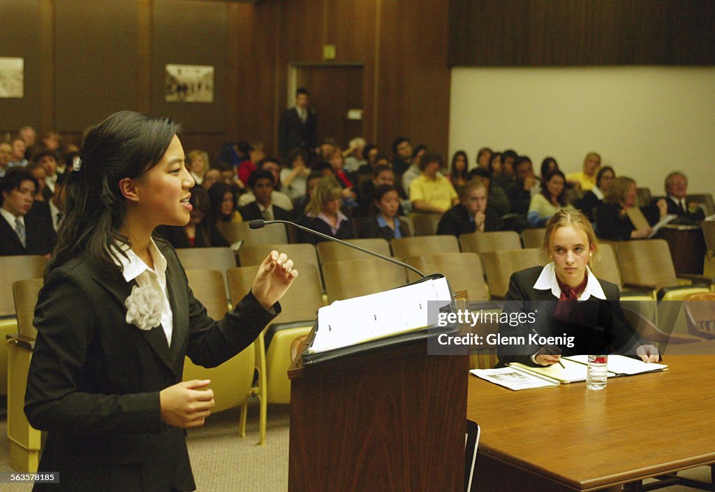 Left to right, Vivienne Nguyen of Canyon High School gives the Pretrial Motion for the Prosecution ,
