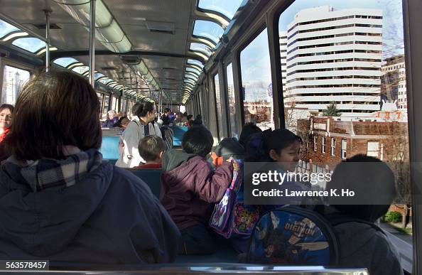 Kids riding the monorail from the Space Needle to Pine st. shopping area in downtown Seattle. Kids riding the monorail from the Space Needle to Pine st. shopping area in downtown Seattle.