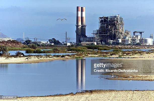 Digital Image taken on Friday, , Oxnard, CA  Photo by ^^^/LAT  Smoke stacks of the Reliant power plant reflecting on the wetlands of Ormond Beach.