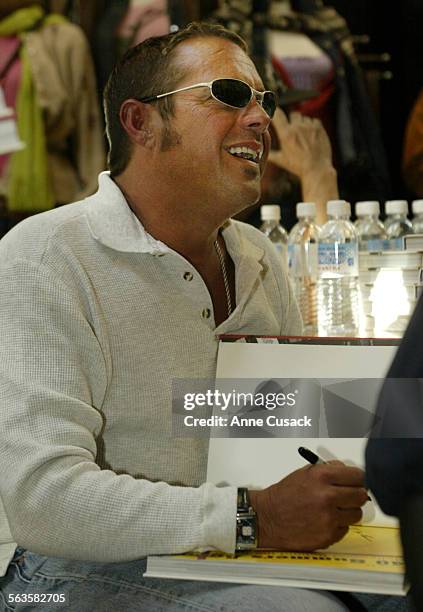 Chad McQueen signs books.A book signing for the book 40 Summers Ago written about Steve McQueen was held at the Lucky Brand Jeans store on the 3rd...