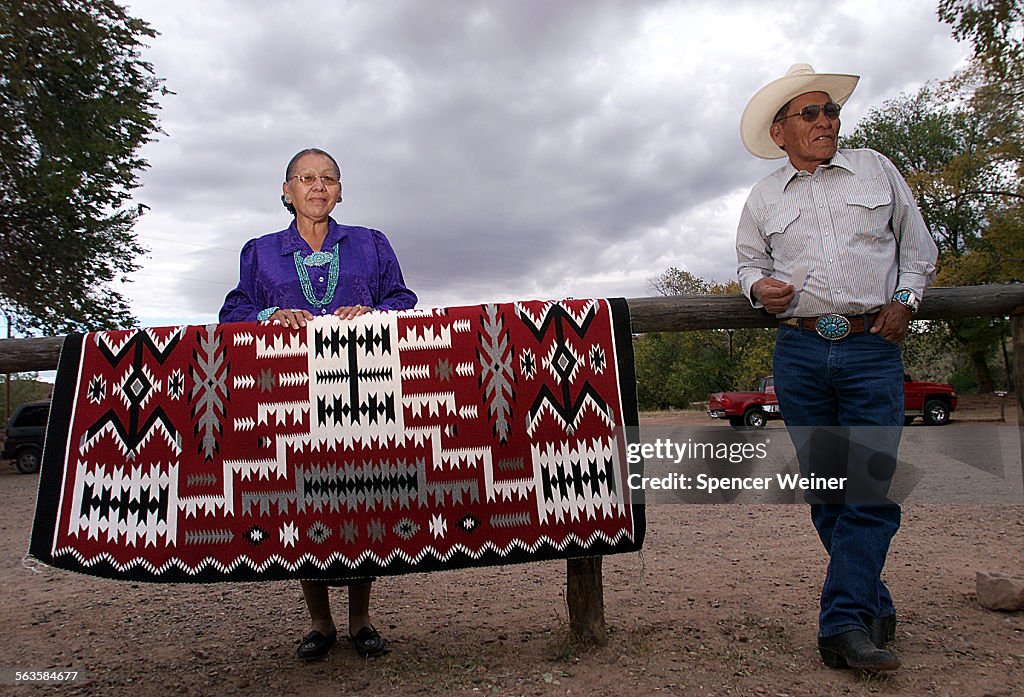 Navajo rug weaver Rena Mountain (cq)(left) and her husband John, outside Hubbell Trading Post, Ganad