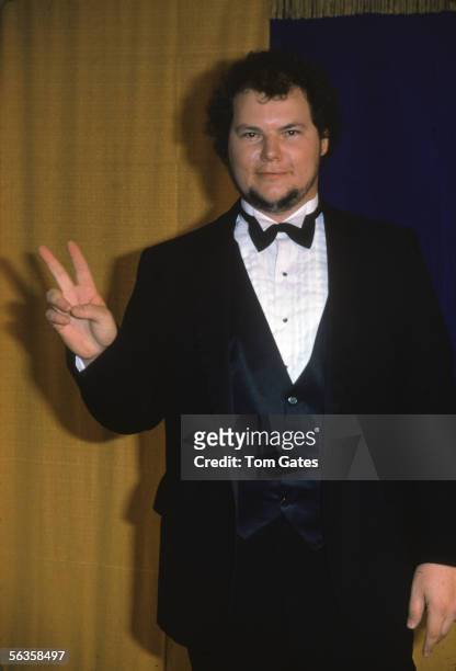 American pop singer and songwriter Christopher Cross flashes the victory sign at the 23rd Annual Grammy Awards, where he won the Grammies for Record...