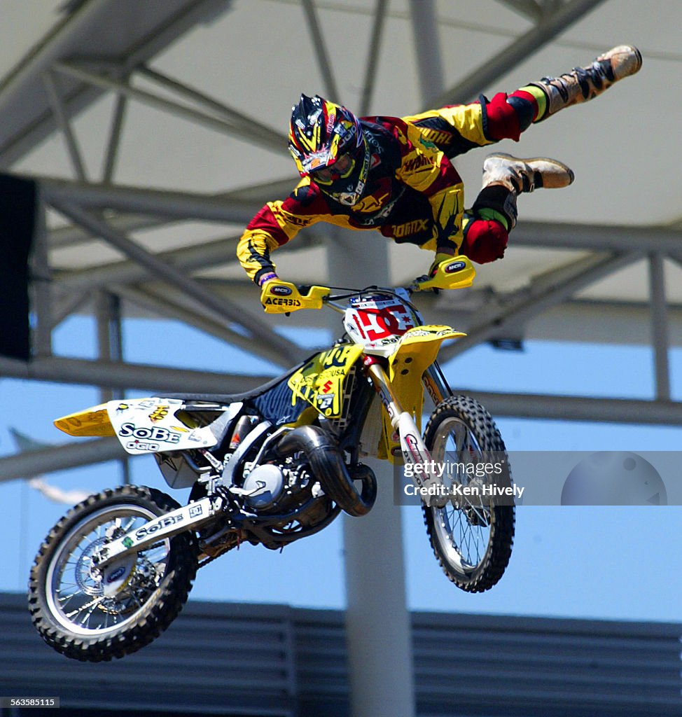 Photo of Travis Pastrana practicing during freestyle at Super Moto X Games at The Home Depot Center 