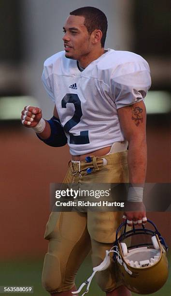 Running back Tyler Ebell, a freshman who has excelled as a starter, during practice on campus, Tuesday afternoon in Westwood. He has a tattoo of...