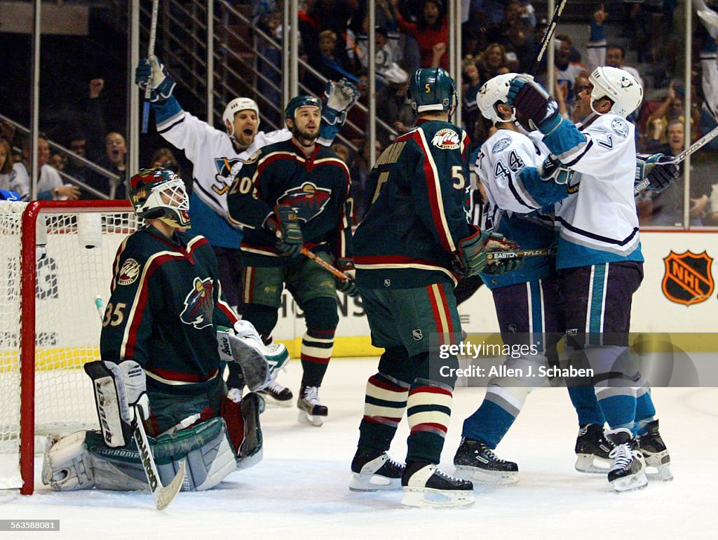 064497.SP.0516.ducks.AJSMinnesota goalie Manny Fernandez looks on as the Ducks celebrate Adam Oate