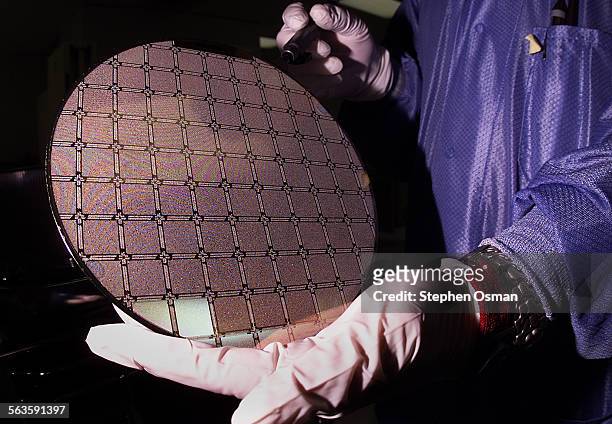 Silicon wafer is prepared for testing at Vitesse Semiconductor. Profile of Vitesse Semiconductor, a 20 year old company with headquarters and factory...