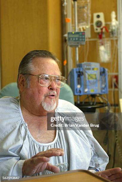 Frank Romero recites the menu from his Gardens of Taxco Restaurant for reporter while recovering from hernia surgery at USC University Hospital...