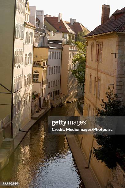 buildings along a canal, kampa island, prague, czech republic - cultura ceca foto e immagini stock