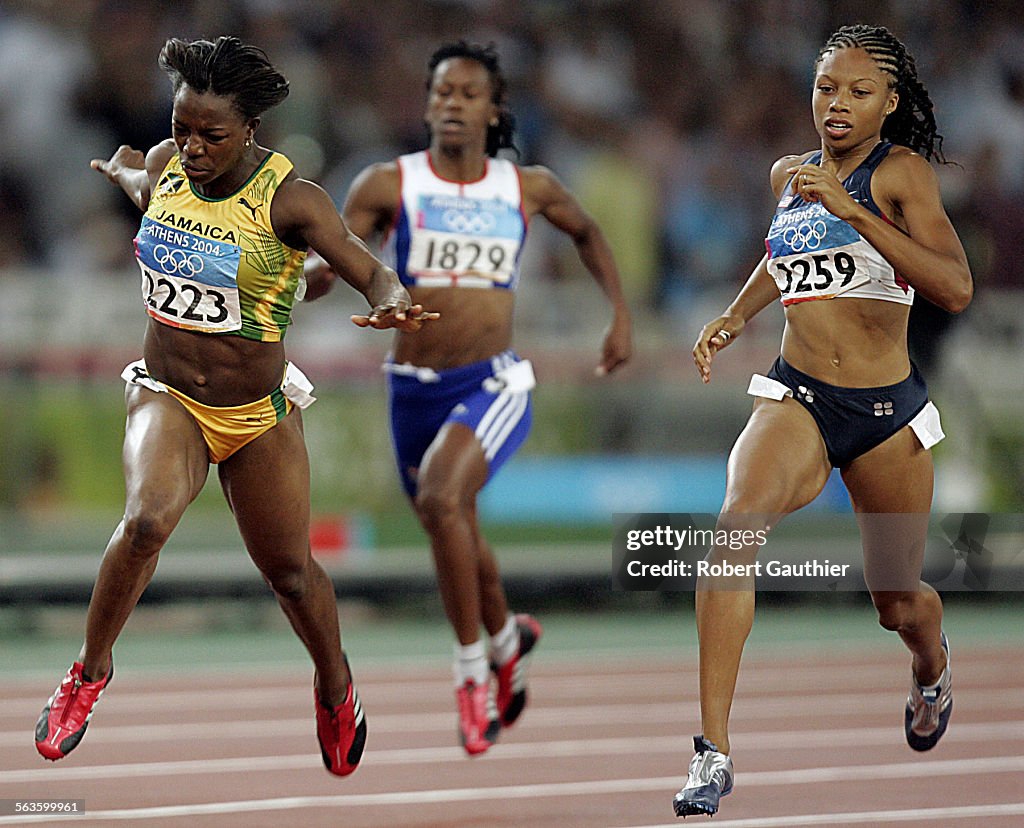 Veronica Campbell of Jamaica edges Allyson Felix of the U.S. for the gold medal in the women's 200 f