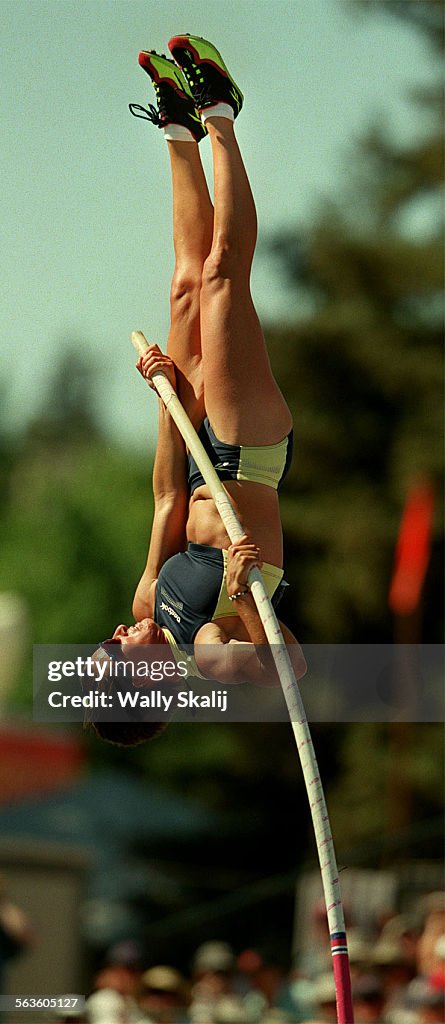 Stacy Dragila springs her way to the olympics finishing first in the pole vault and later broke a ne